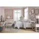 Realyn Chipped White and Brown 6 Drawer Dresser and Arched Mirror