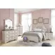 Realyn Chipped White and Brown 6 Drawer Dresser and Arched Mirror