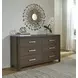 Darimore Burnished Brown 6 Drawer Dresser
