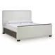 Darimore Burnished Brown and White Performance Fabric King Upholstered Panel Bed