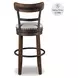 Valebeck Brown Tall Upholstered Swivel Bar Stool