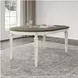 Realyn White Oval Extendable Dining Table