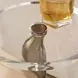 Remolino Warm Bronze and Black Round Crystal Top Drink Table
