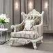 Vanaheim Gold Upholstered Accent Chair with Pillow and Nailhead Trim