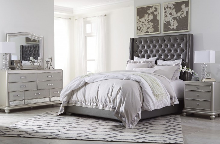 Coralayne Gray Textured Upholstered Panel Bedroom Set from ...