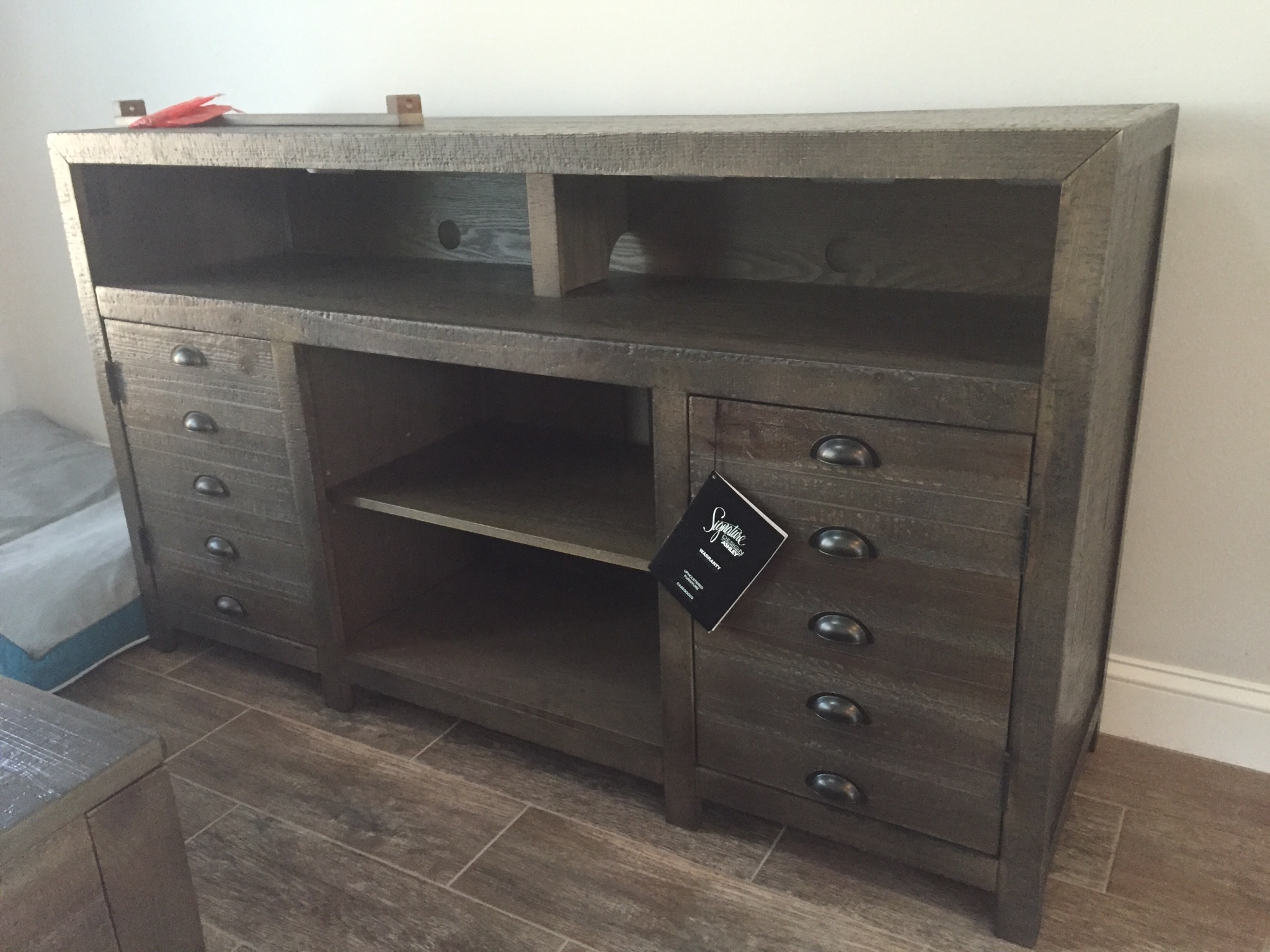 Keeblen Grayish Brown TV Stand from Ashley (W67838) Coleman Furniture